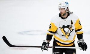 Pittsburgh Penguins defenseman Kris Letang (58) warms up