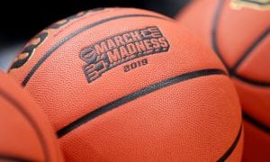 a basketball with March Madness 2019 logo
