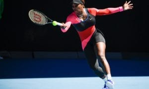United States' Serena Williams hits a forehand return to Japan's Naomi Osaka