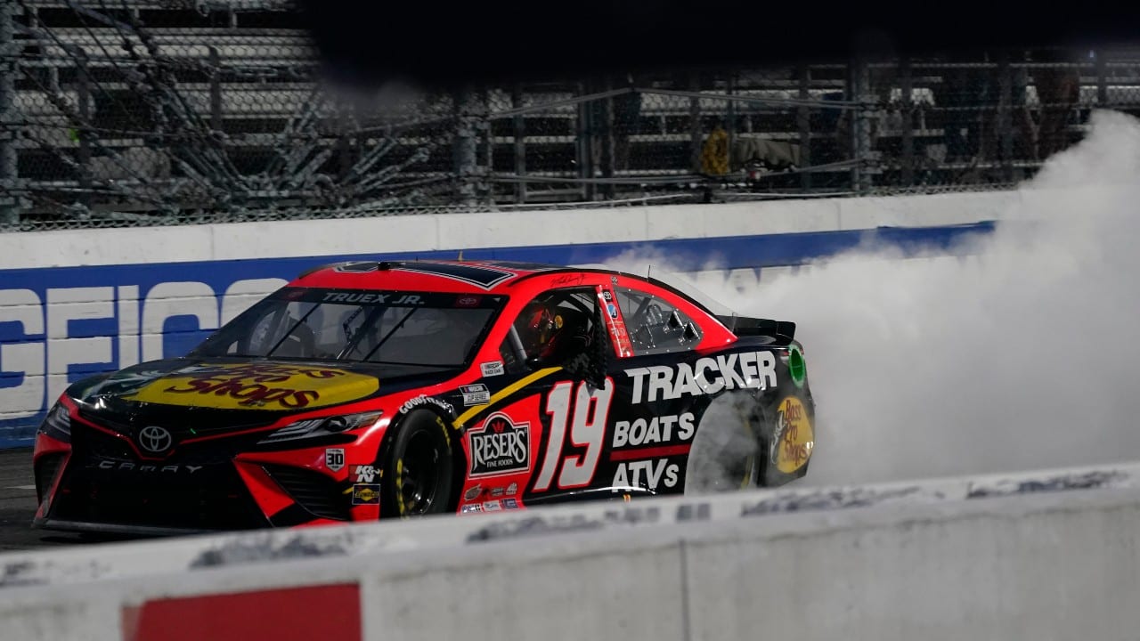 Martin Truex Jr. (19) does a burnout as he celebrates winning the NASCAR Cup Series