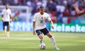 France's Kylian Mbappe goes for the ball during the Euro 2020 soccer championship