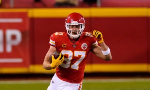 Kansas City Chiefs tight end Travis Kelce runs the ball