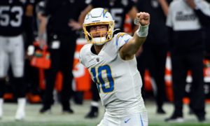 Los Angeles Chargers quarterback Justin Herbert (10) gestures during an NFL football game