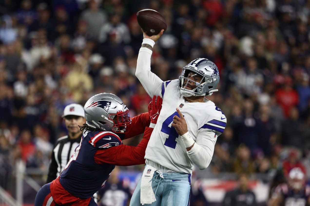 Dallas Cowboys quarterback Dak Prescott throws during an NFL football game