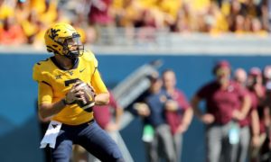 West Virginia QB Jarret Doege #2 in action against Virginia Tech