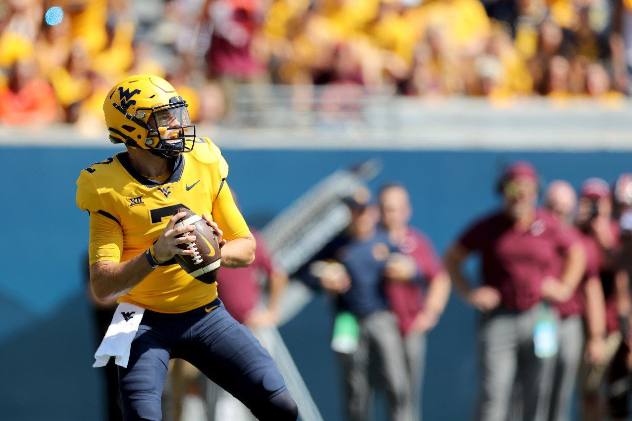 West Virginia QB Jarret Doege #2 in action against Virginia Tech