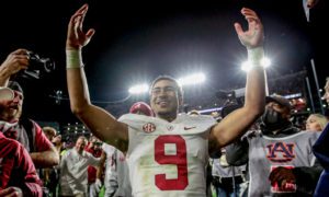 Alabama quarterback Bryce Young (9) celebrates after defeating Auburn