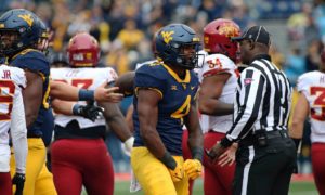 West Virginia running back Leddie Brown (4) celebrates