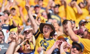 West Virginia fans reacts during the second half of an NCAA college football game