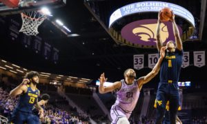 West Virgina Mountaineers face the Kansas Jayhawks in this weekend's college basketball match-up