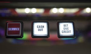 Image of old slot machine buttons for story on WV Lottery fining two facilities with video lottery terminals in October 2023